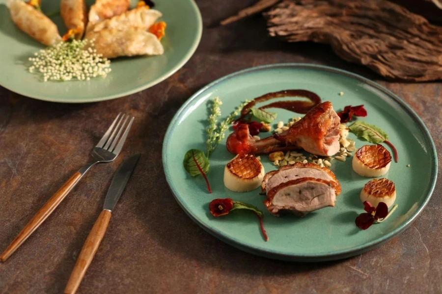 Turquoise Plates with a Goose Leg and Pate