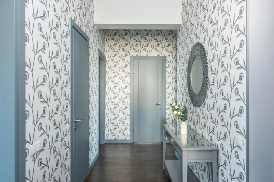 Entryway of a house with gray-theme wallpaper