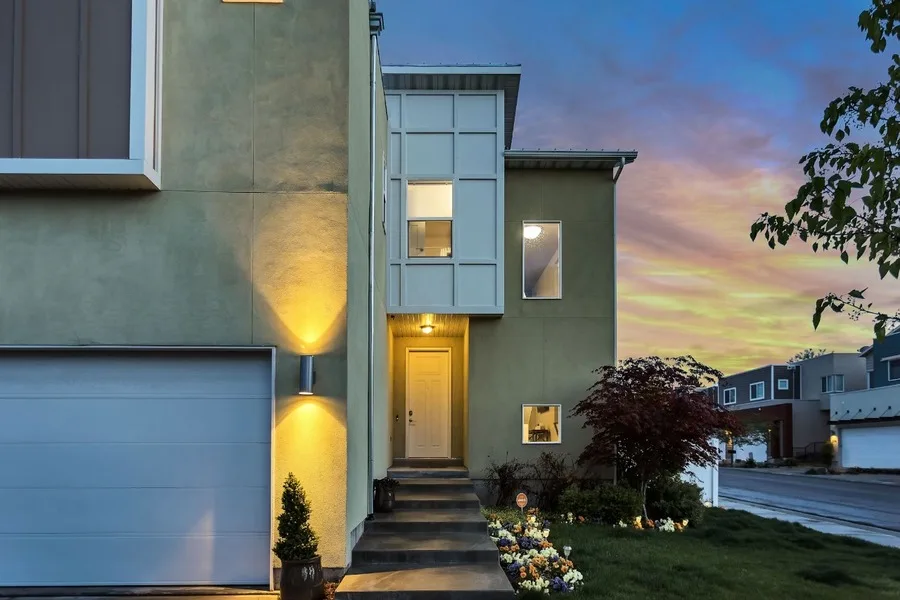 Outdoor lamps turned on outside a modular home