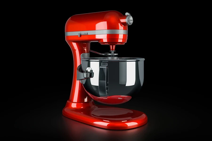 An aesthetic red stand mixer on a black background