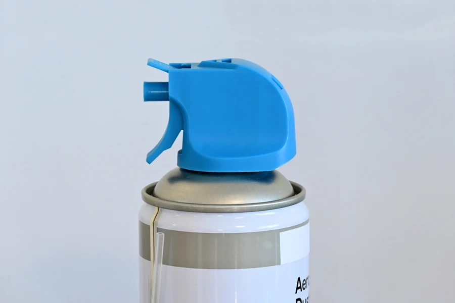 An air duster with a blue nozzle