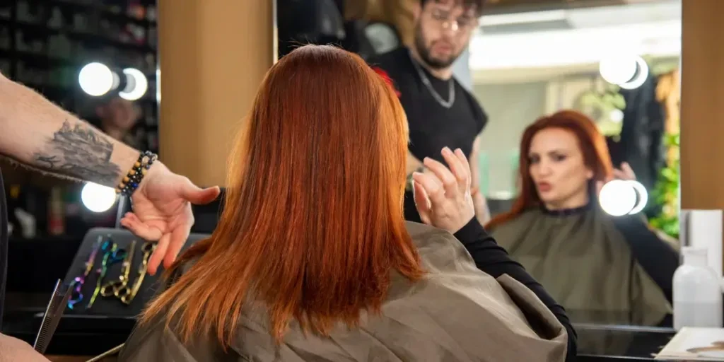 Beautiful redhead woman with long and shiny hair