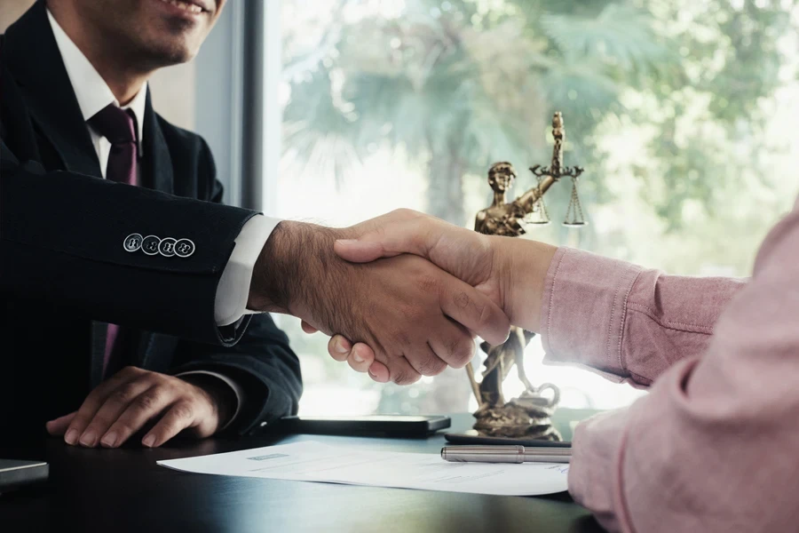 Businessmen shaking hands over an agreement