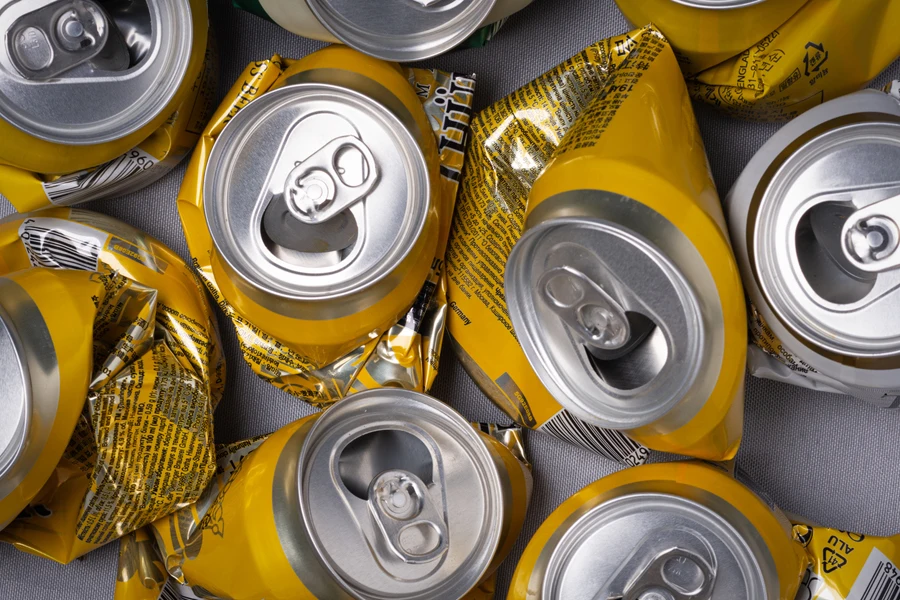 Close-up of crumpled aluminum cans of the same size