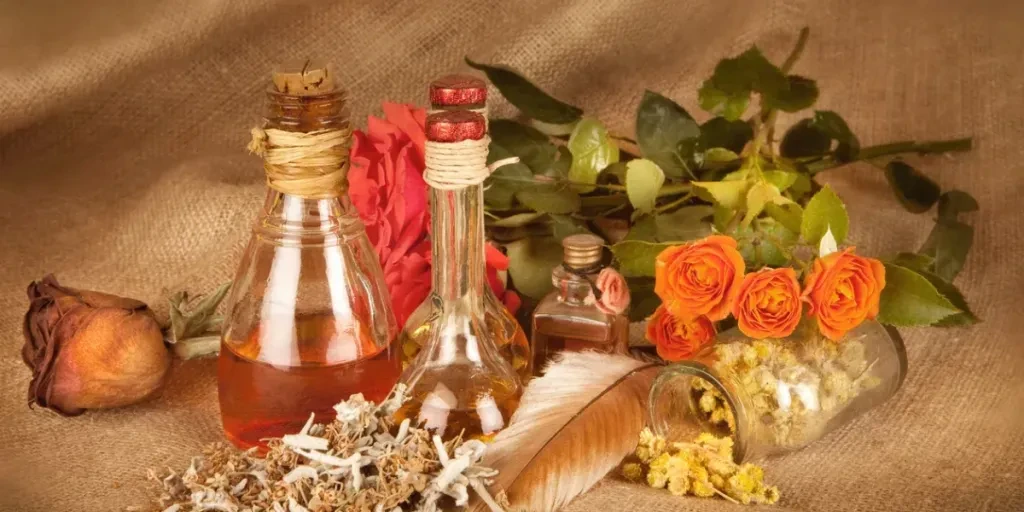 Essential oil bottles,herbs and flowers