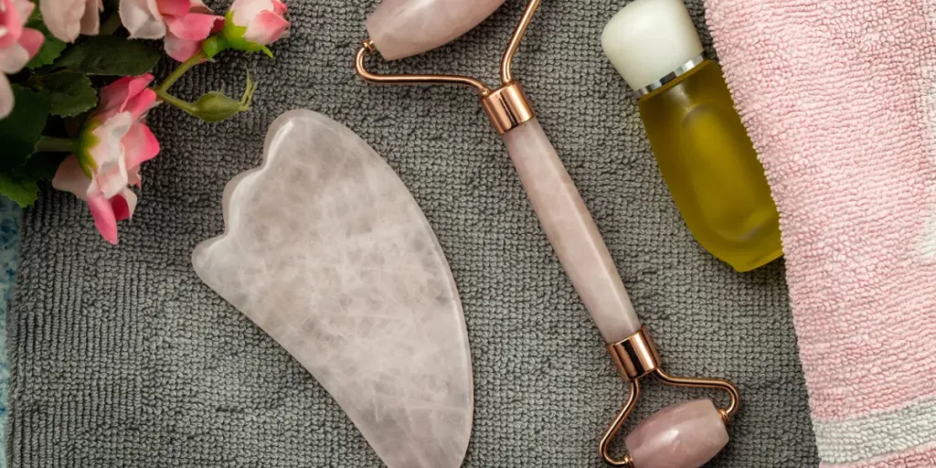 Jade Roller and Gua Sha for beauty facial massage therapy with towel