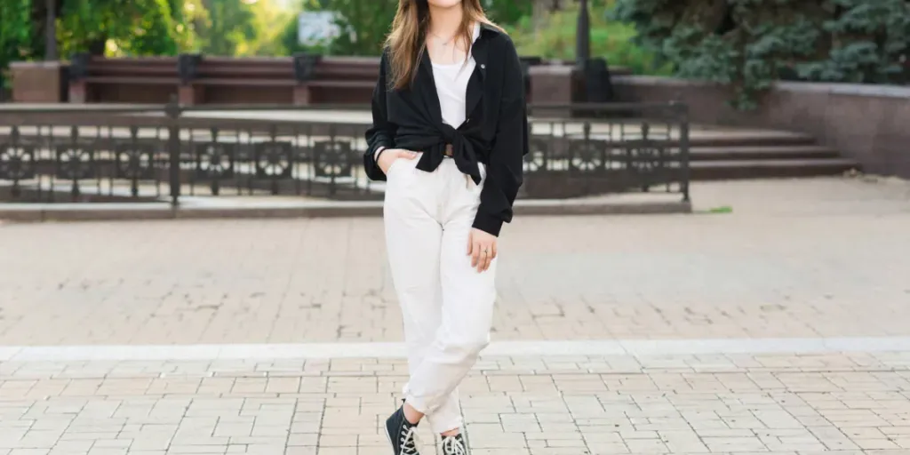 Portrait of a young and attractive happy Caucasian girl in casual clothes on a summer day