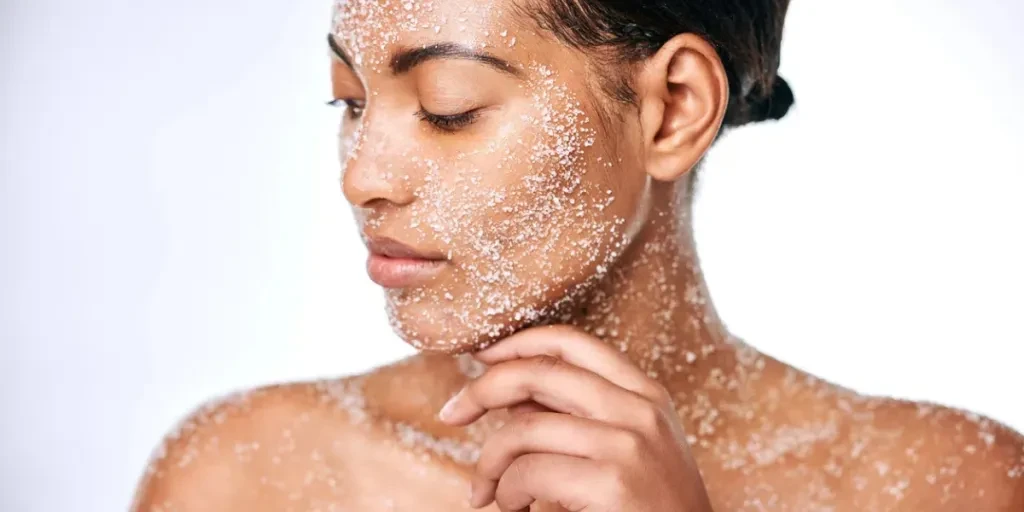 Studio shot of a beautiful young woman using sea salt in her beauty routine