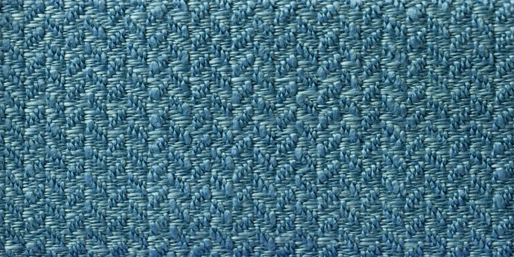 Texture di sfondo di colore blu navy in materiale tessile intrecciato con motivo in vimini