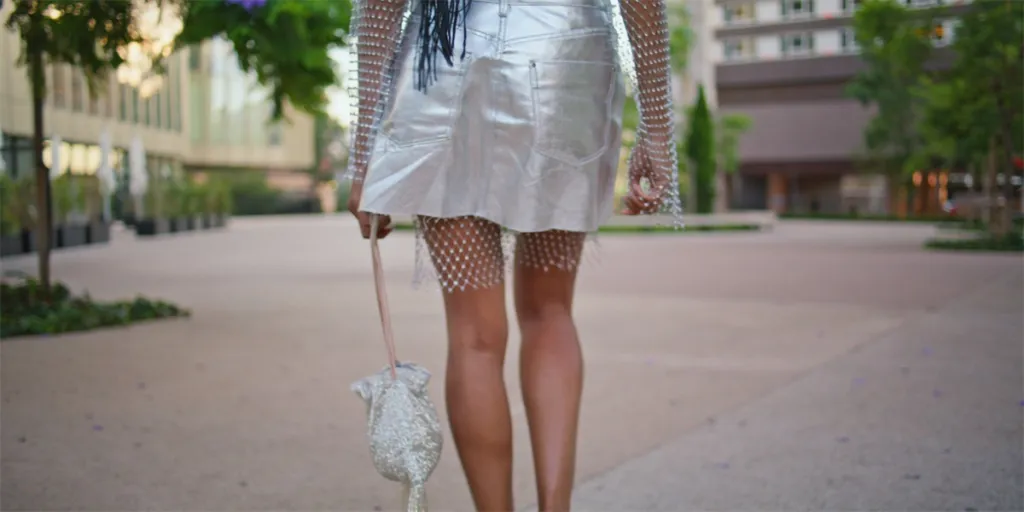 Trendy heeled footwear model stepping empty city closeup