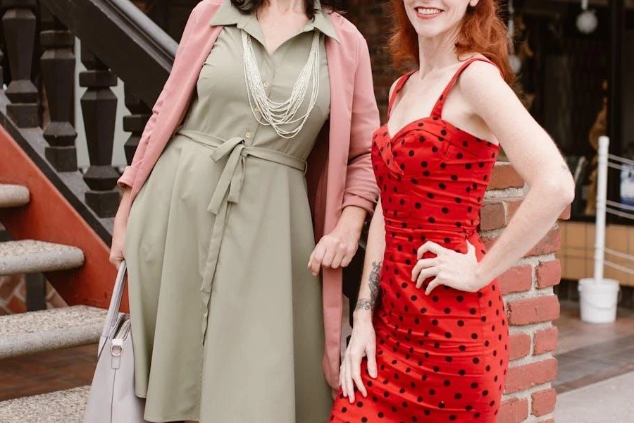 Two women wearing casual midi dresses