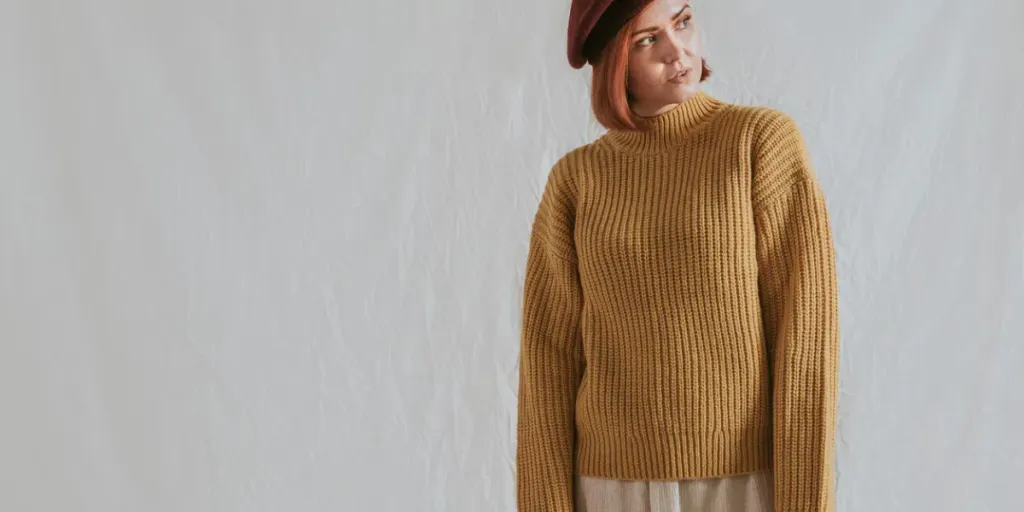 Woman in yellow jumper and brown beret, autumn apparel fashion design