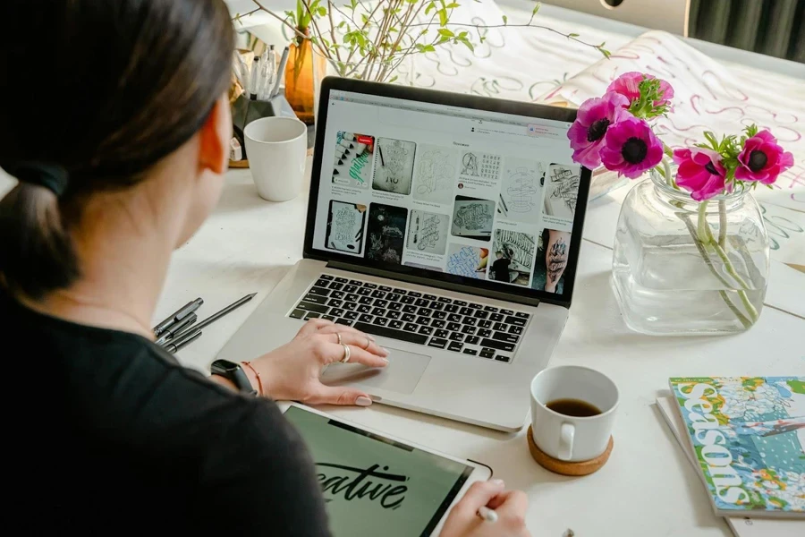 Woman shopping online via her laptop