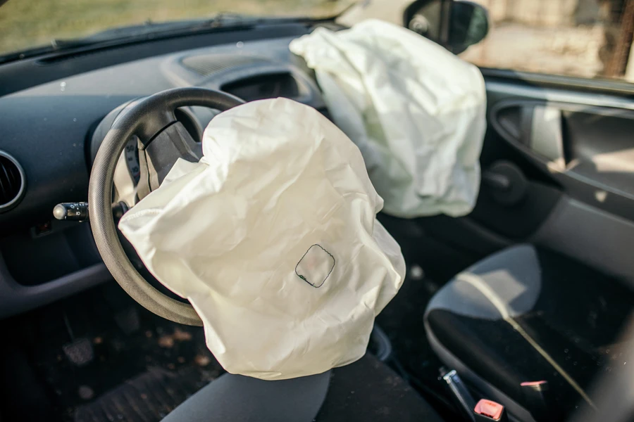 deployed airbags in a car