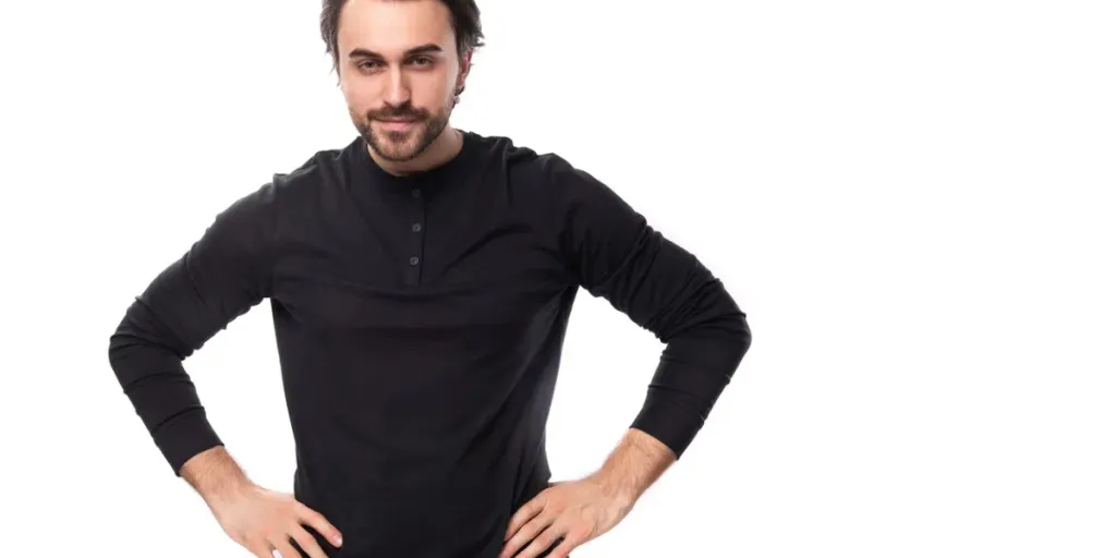 handsome young 30 year old guy with a beard dressed casually on a white background