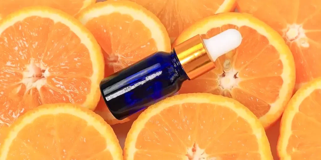 lose up of Citrus fruit essential oil, vitamin c serum