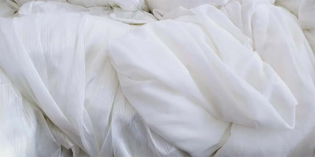 pile of white tulle curtains