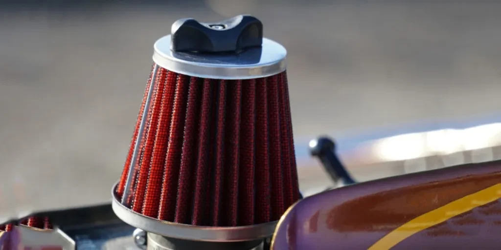 A red conical engine air filter