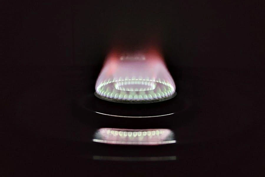 A reduced flame from a stove burner