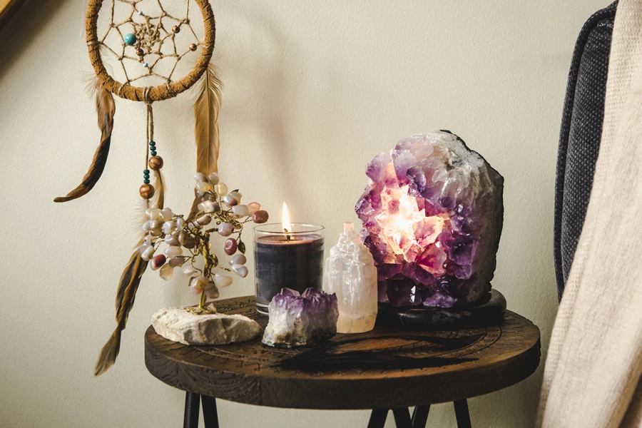 Candle and crystals used for spiritual decor