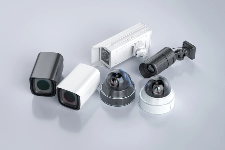 Different types of CCTV cameras on a grey background