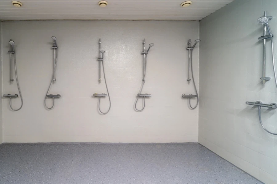 Multiple showers placed in a sports center bathroom