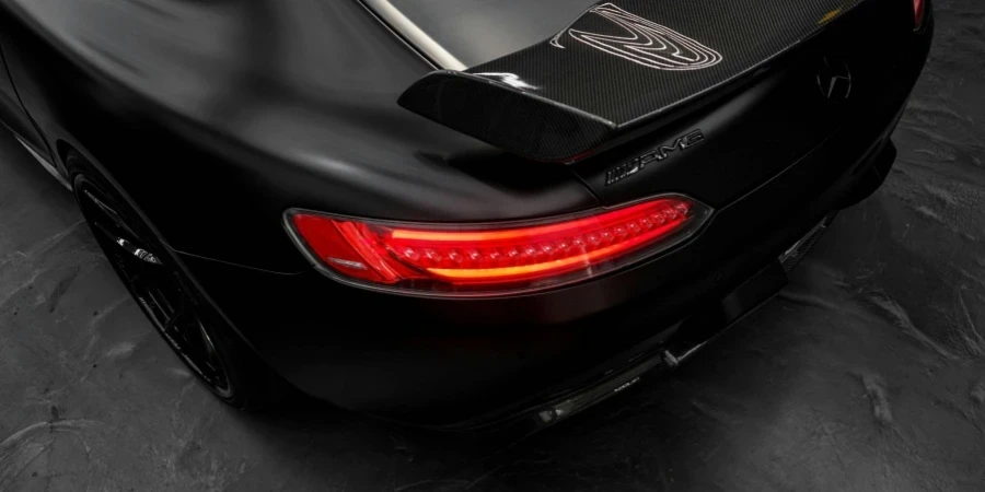 The Tail Light of a Black Car