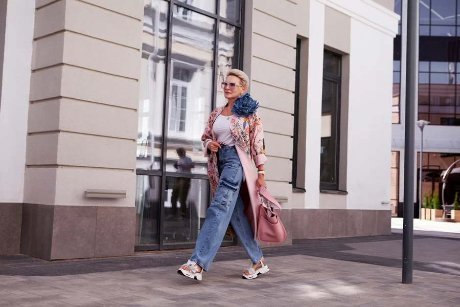 Woman walking on the street in loose cargo jeans