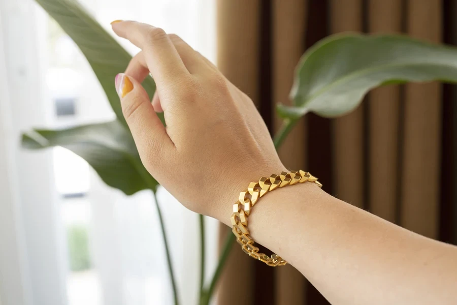 Woman wearing a gold-filled bracelet