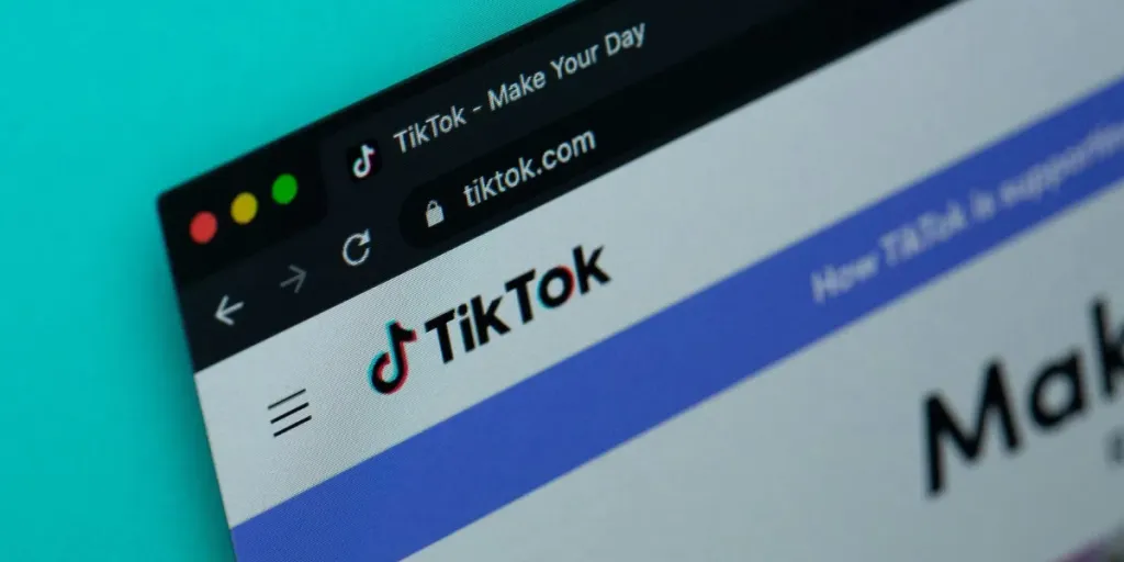 TikTok homepage on a laptop screen