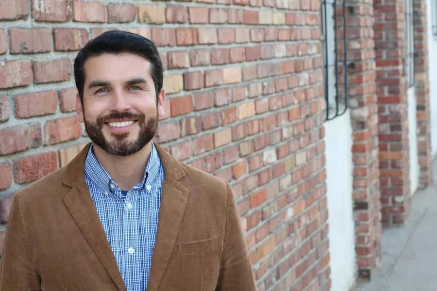 Young man wearing a corduroy blazer