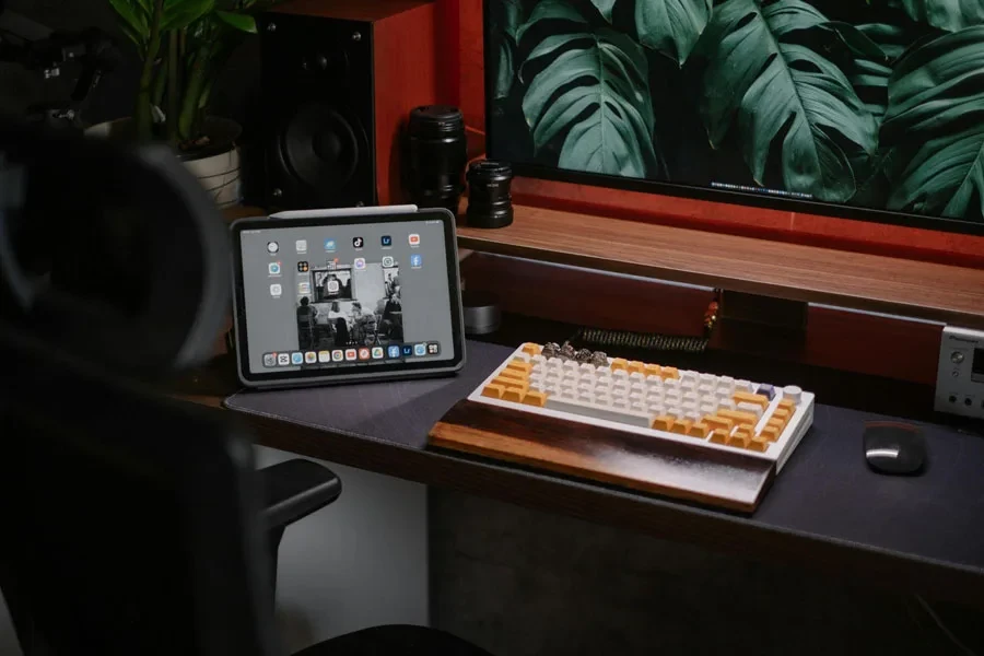 A Modern Home Desk Setup with a Computer and a Tablet