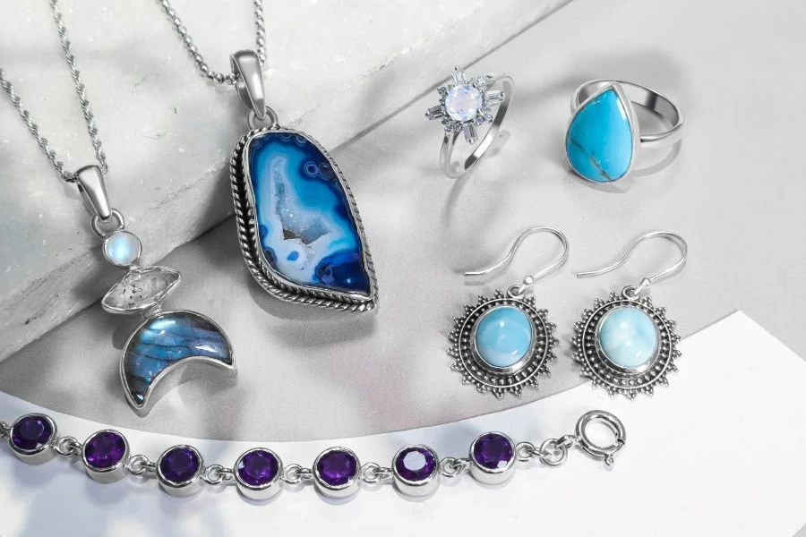 A collection of jewelry on a white surface