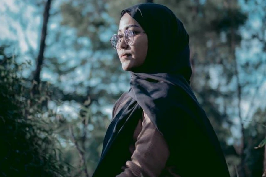 A woman wearing a Shayla headscarf