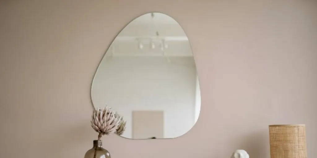 Asymmetrical wall mirror with no frame