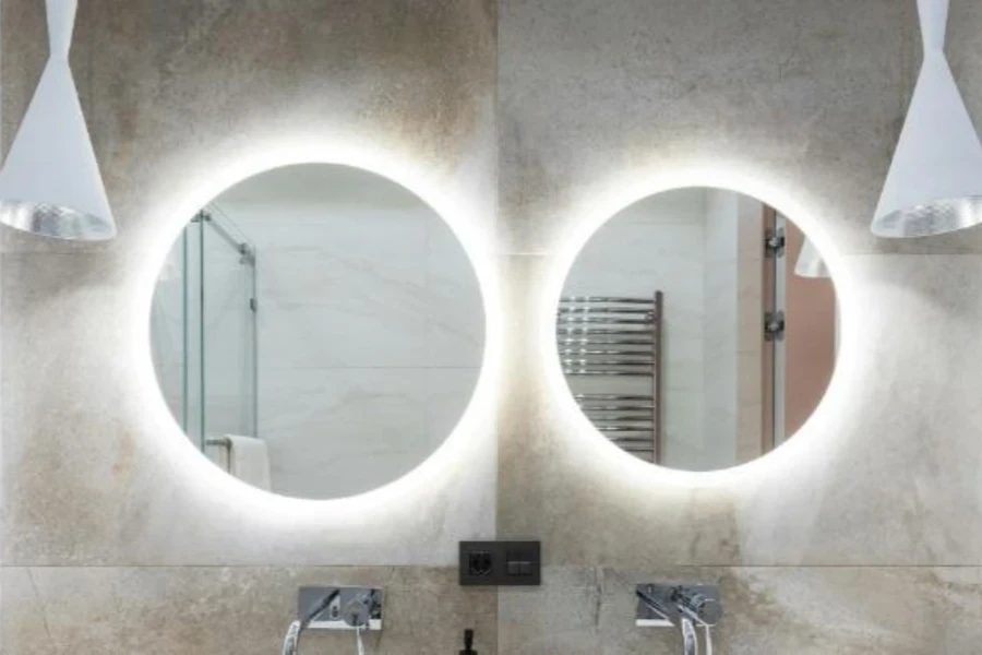 Bathroom vanity with large and small asymmetrical LED mirrors