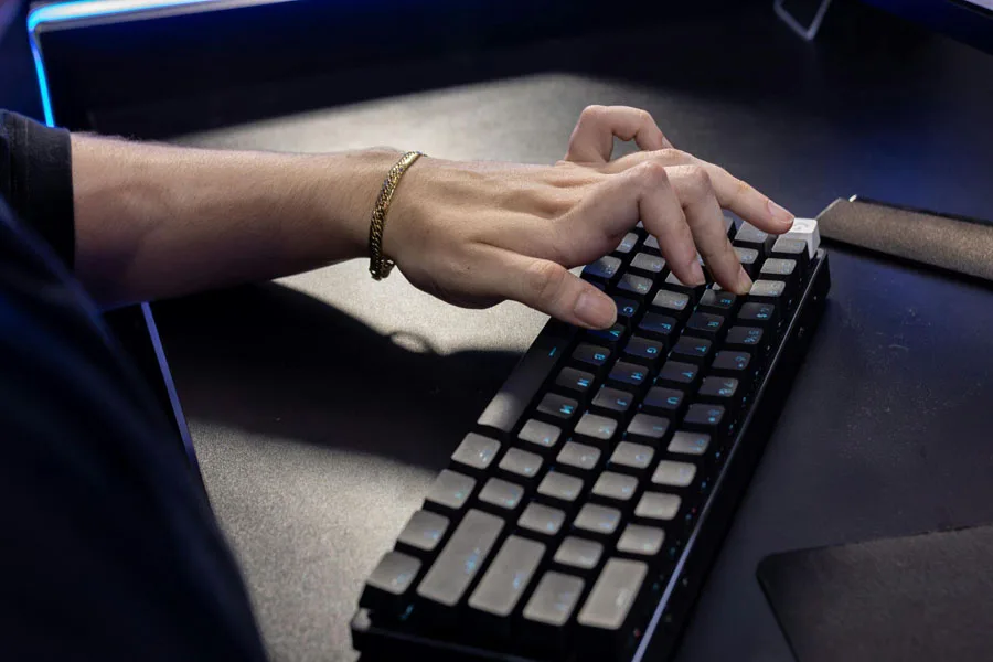 Close-up of Hand Typing on Mechanical Keyboard