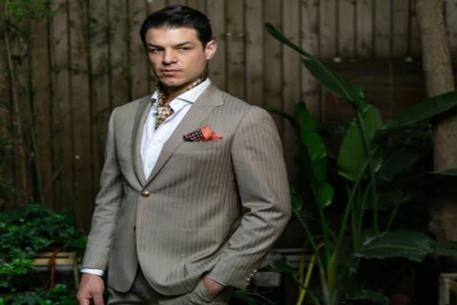 Gentleman in pinstripe suit with classic slicked-back hair