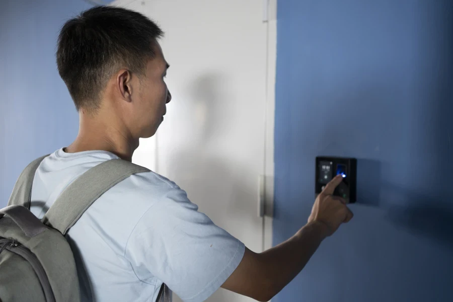 Man pressing on smart AI door lock