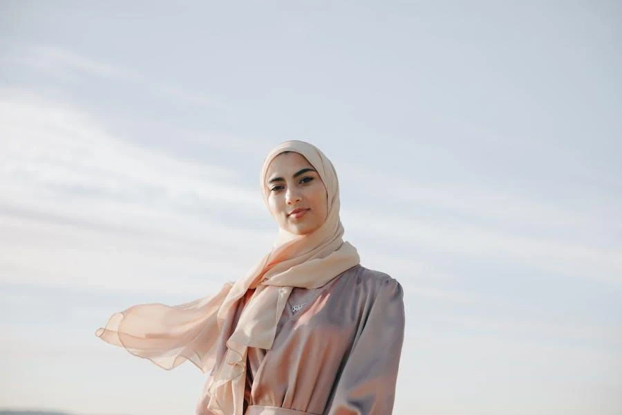 Muslim woman wearing a maxi dress and Pashmina hijab