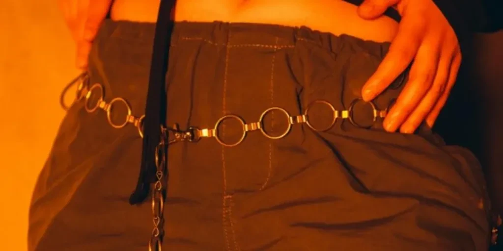 Woman wearing ring hoop chain belt