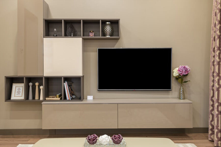 floating tv stand with a tv above