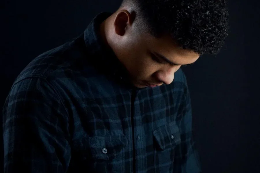 Man rocking a blue and black flannel overshirt