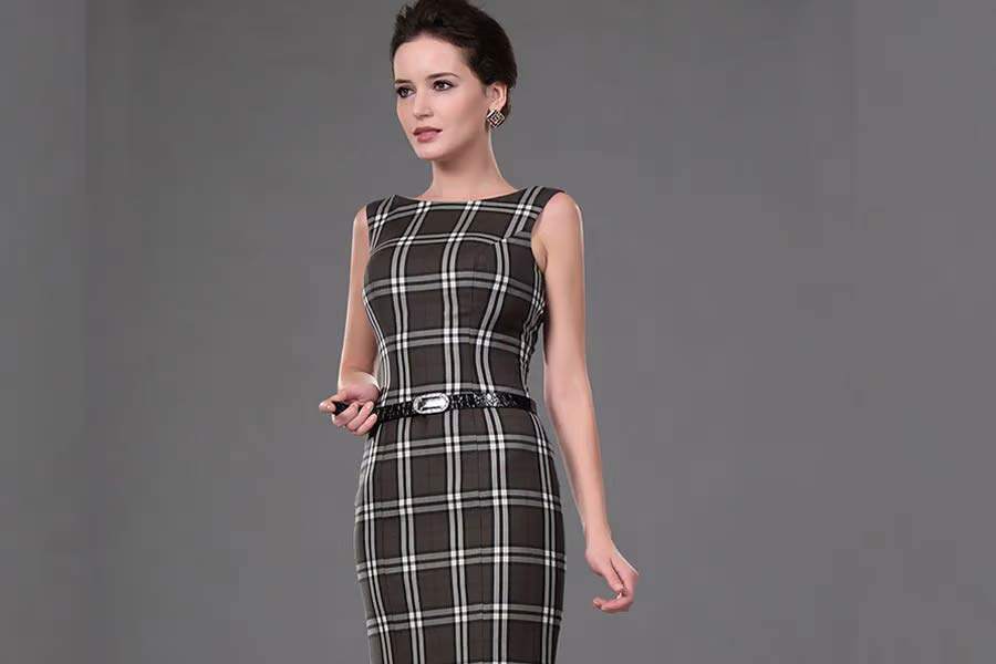 Woman in gray checkers business cocktail dress