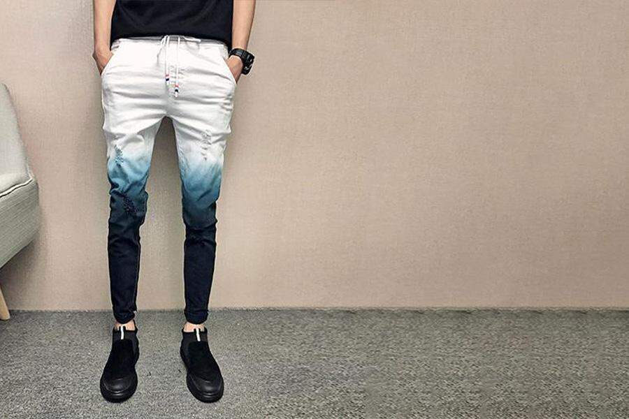 A man in ombre gradient denims