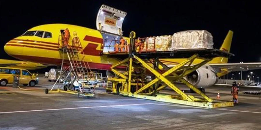 DHL aircraft loading air containers