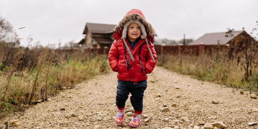 Toddler wearing a red puffer jacket
