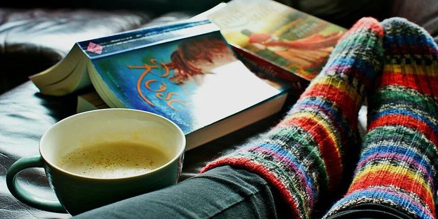 Warm slouch socks and coffee to stay warm in winters