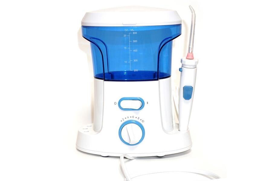 A corded dental irrigator