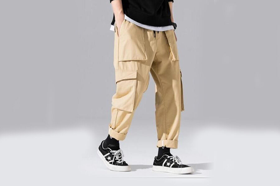 Teen posing with light brown cargo pants